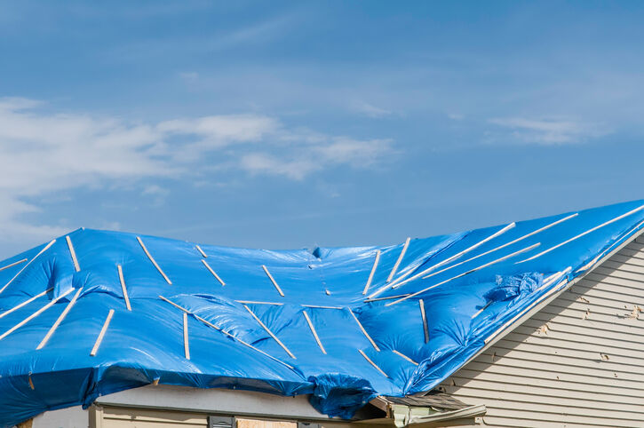 Roof tarp installation by Master Rebuilder of Florida Inc.